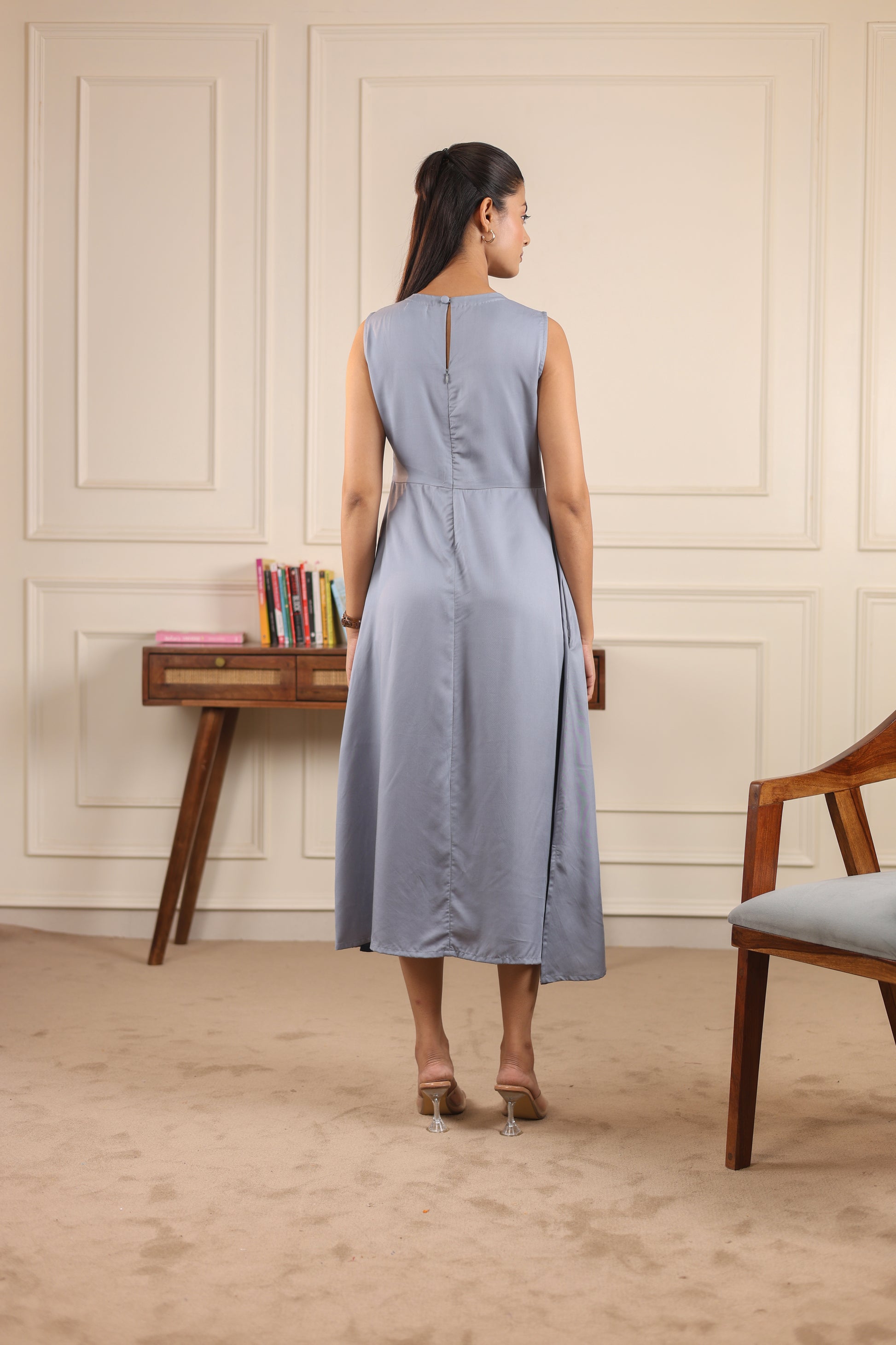 Back view of a Tencel midi dress showing a fluid, relaxed silhouette - NIOUR breathable sustainable clothing.