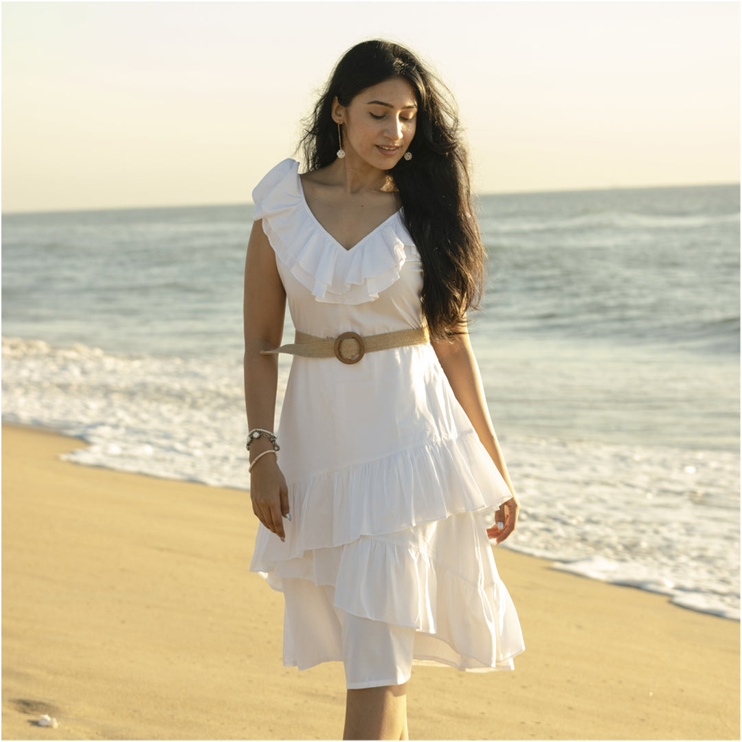 Woman in white River Ruffle Dress outdoors – sustainable Tencel midi dress – eco-friendly fashion by NIOUR India